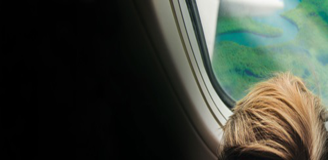 Looking out the window of an airplane